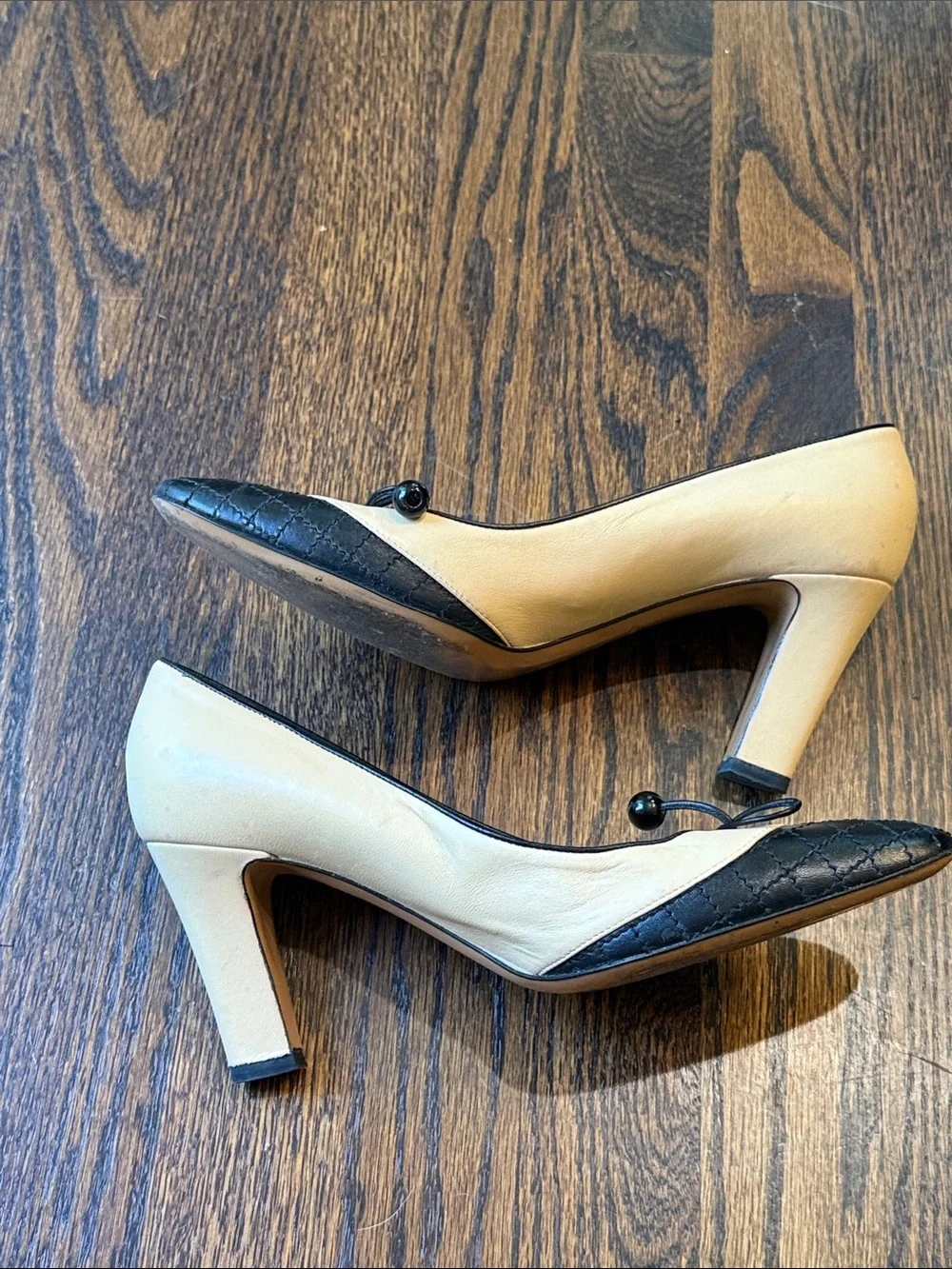 CHANEL Beige and Black Quilted Cap-Toe Bow Pumps size 39